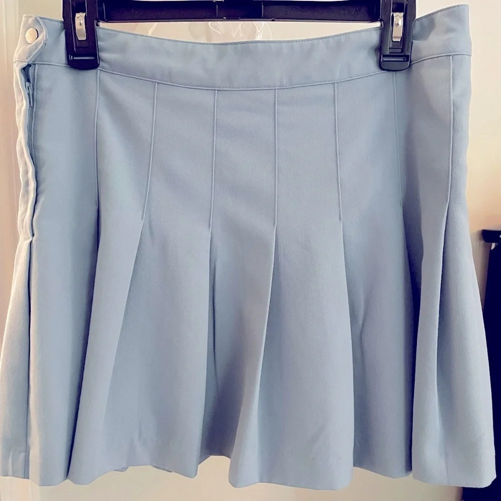 DIVIDED size 10 powder Blue pleated mini skirt. Side waist snap & hidden zip.